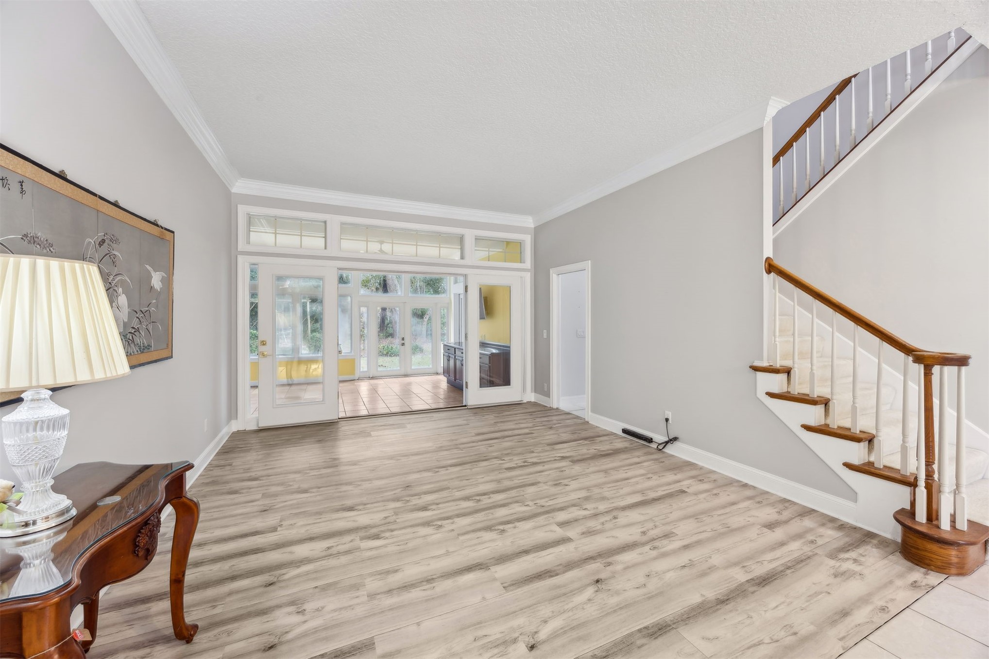 4433 Bean Street Fernandina Beach, FL 32034 - Photo 6 of 79 a view of an empty room with wooden floor and a window