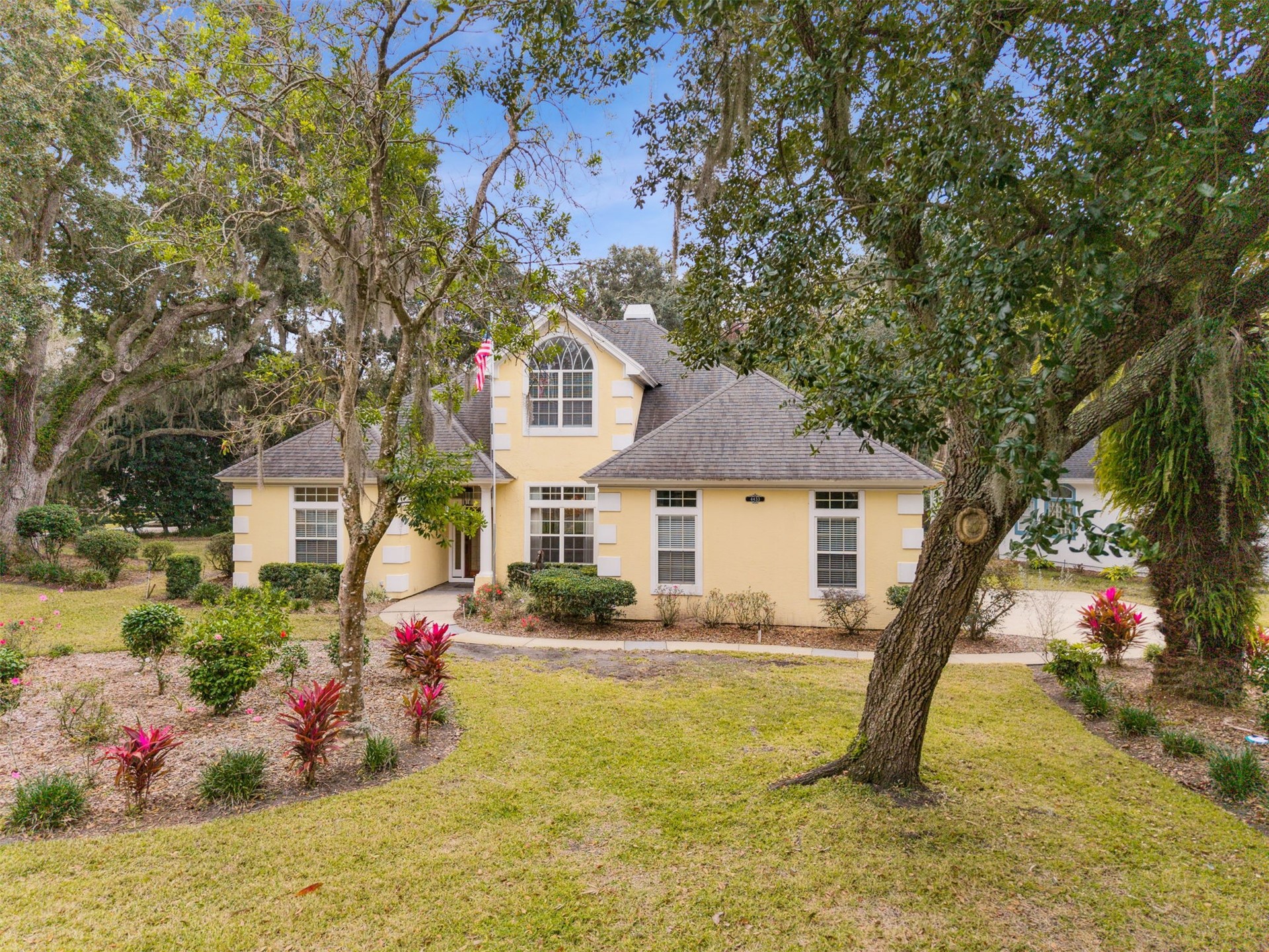 4433 Bean Street Fernandina Beach, FL 32034 - Photo 68 of 79 a front view of house with small garden