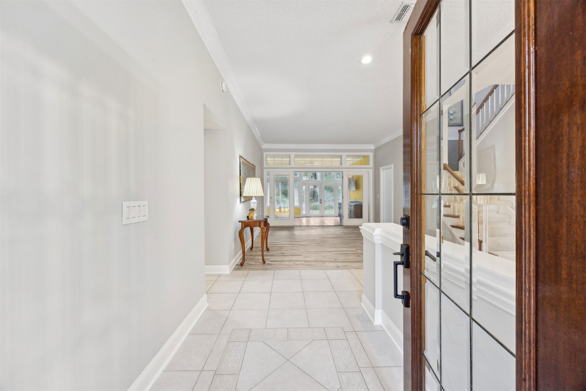 4433 Bean Street Fernandina Beach, FL 32034 - Photo 10 of 79 a view of a hallway with wooden floor and furniture