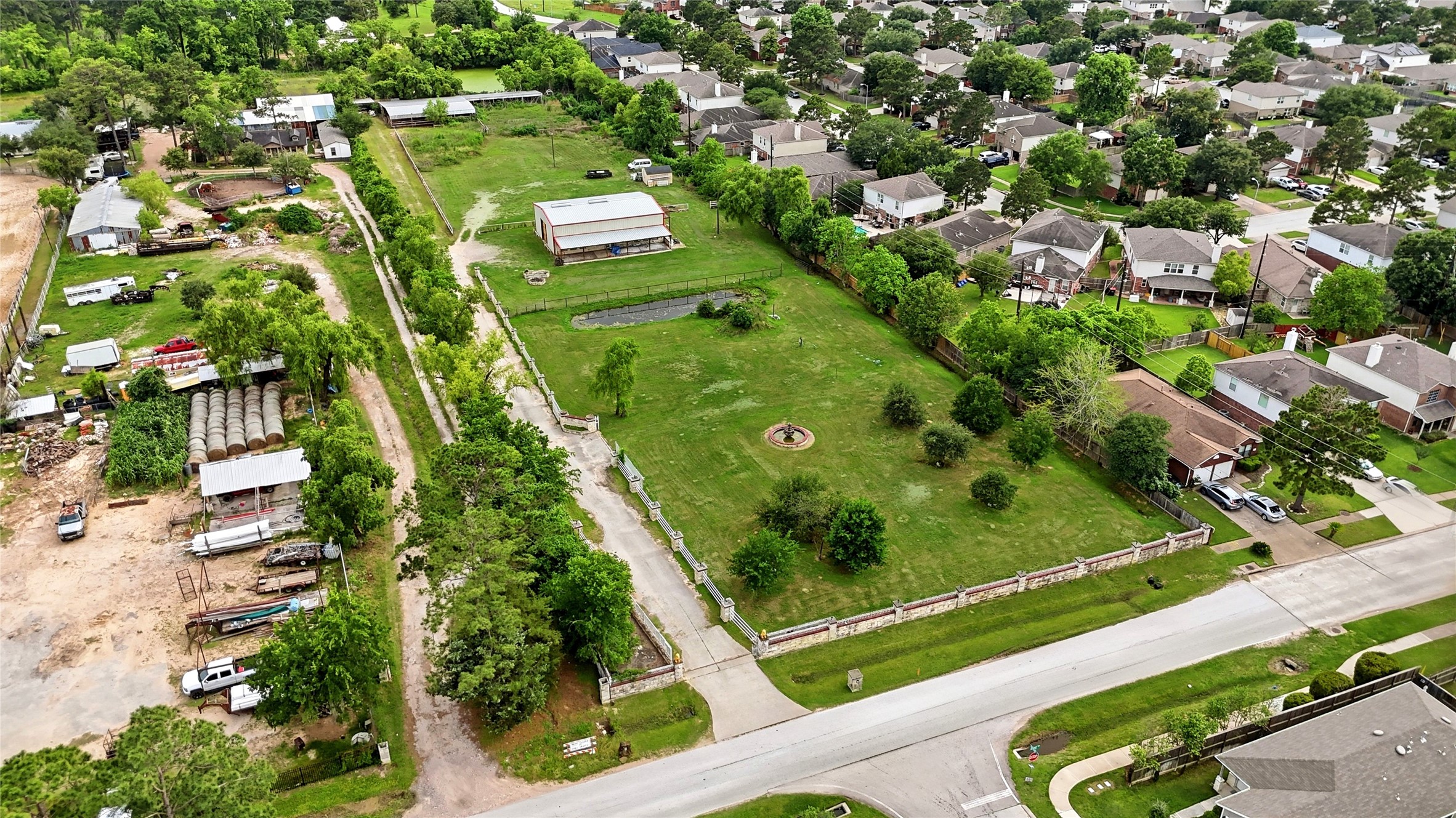 11741 Ezekiel Road Tomball, TX 77375 - Photo 27 of 30 an aerial view of a residential houses with outdoor space