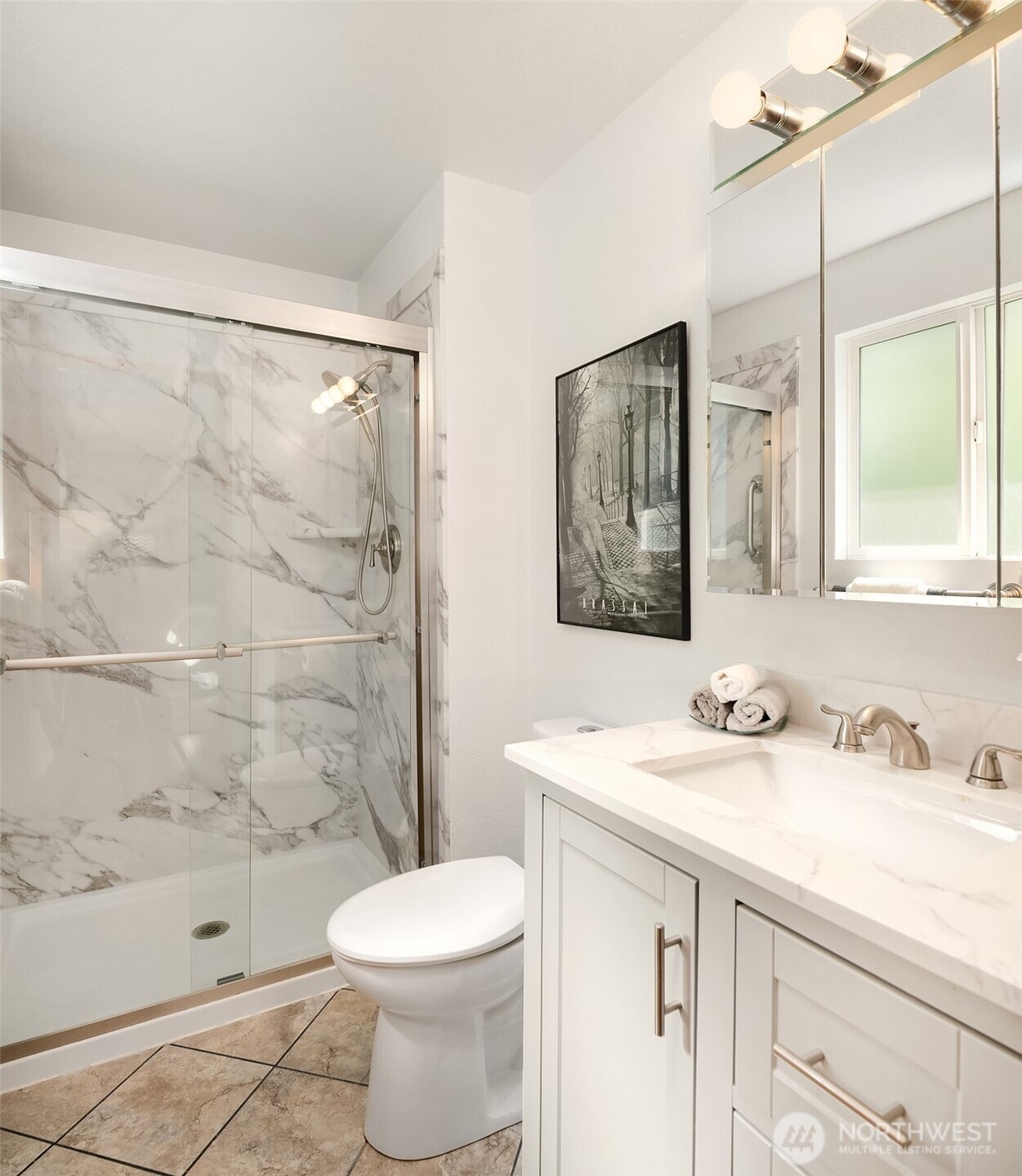 21331 2nd Avenue Southeast Bothell, WA 98021 - Photo 15 of 34 a bathroom with a sink a toilet and shower