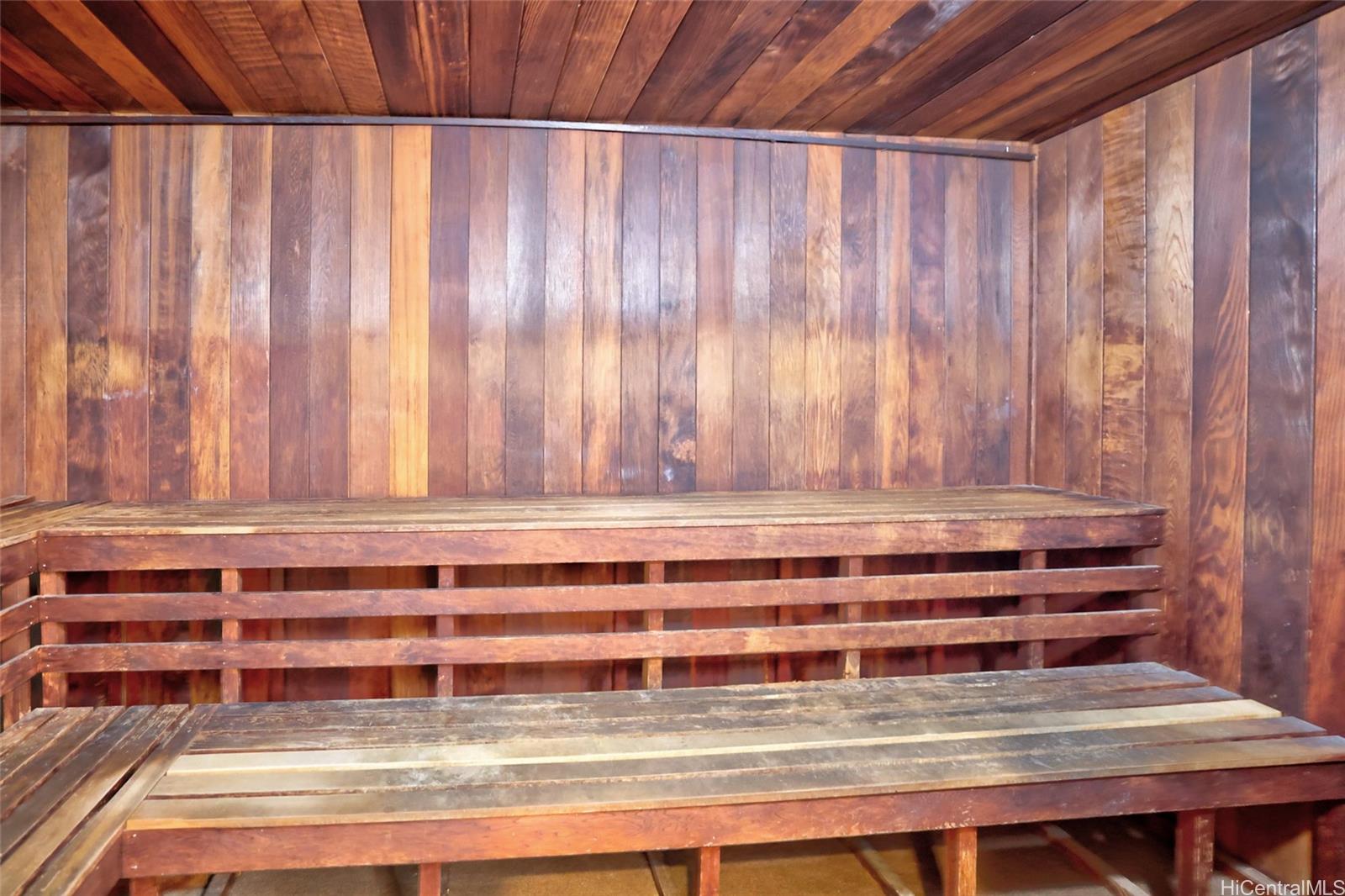 555 Hahaione Street, Unit 3E Honolulu, HI 96825 - Photo 16 of 25 a view of a dishwasher door and wooden floor