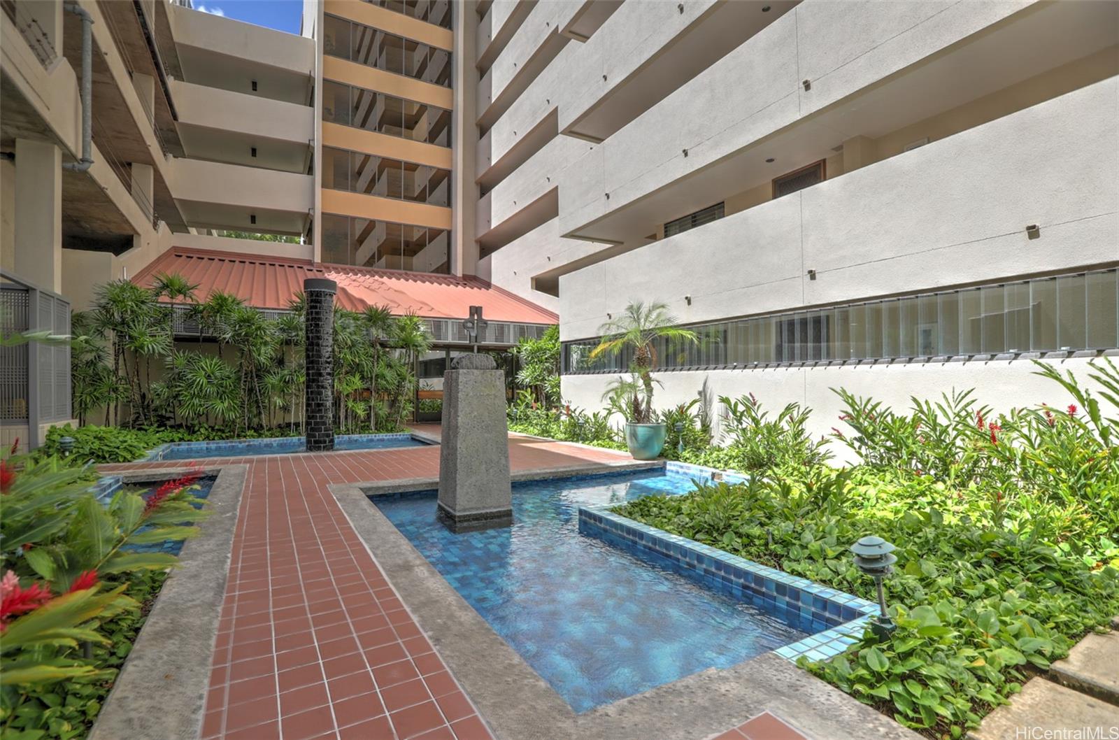 555 Hahaione Street, Unit 3E Honolulu, HI 96825 - Photo 16 of 23 Zen-like entry to the Commodore.