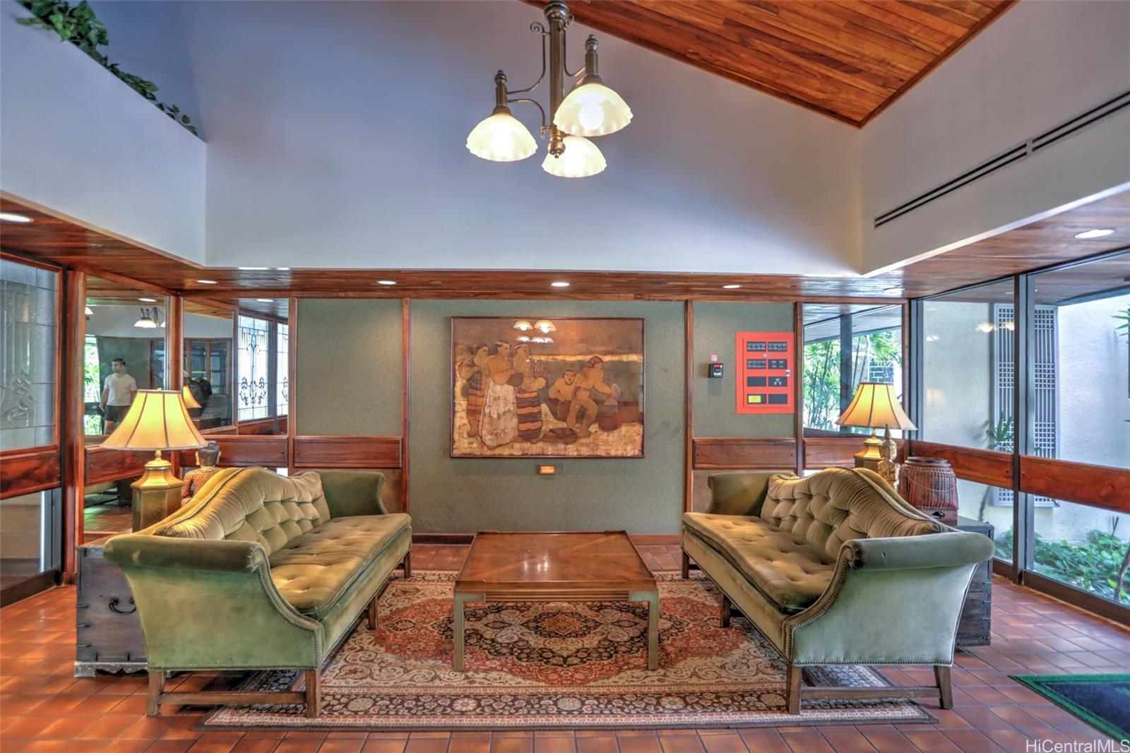 555 Hahaione Street, Unit 3E Honolulu, HI 96825 - Photo 19 of 25 a living room with furniture and a large window