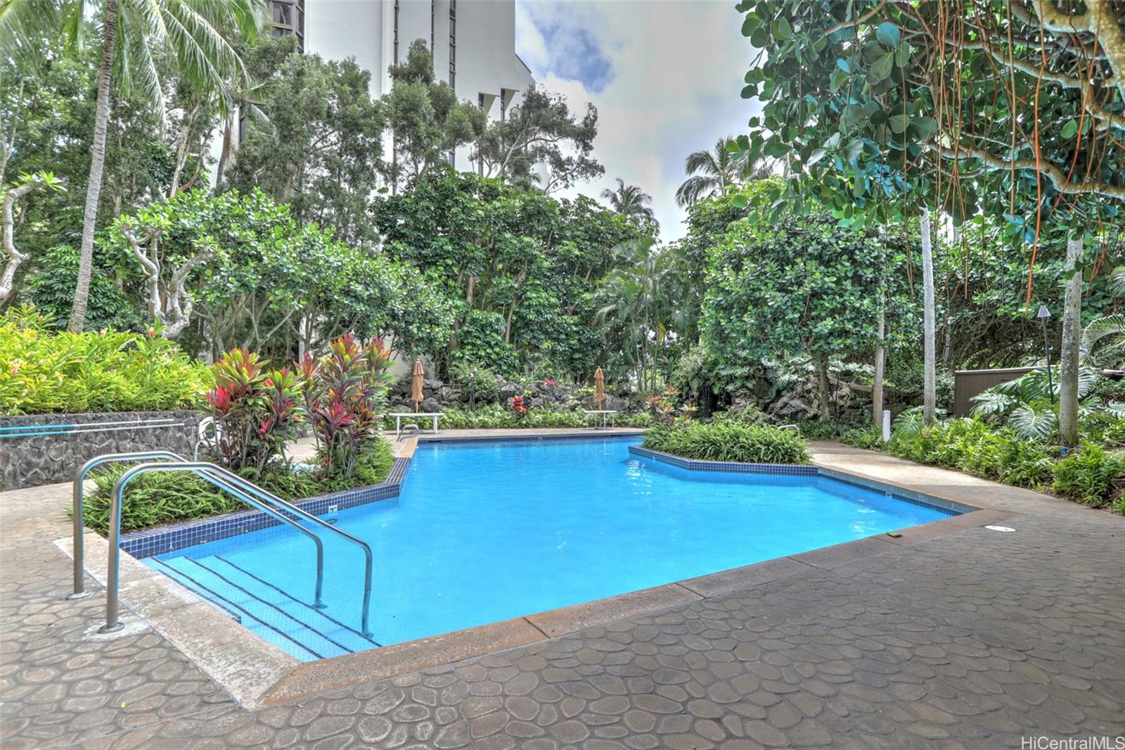 555 Hahaione Street, Unit 3E Honolulu, HI 96825 - Photo 23 of 25 a view of swimming pool with outdoor seating