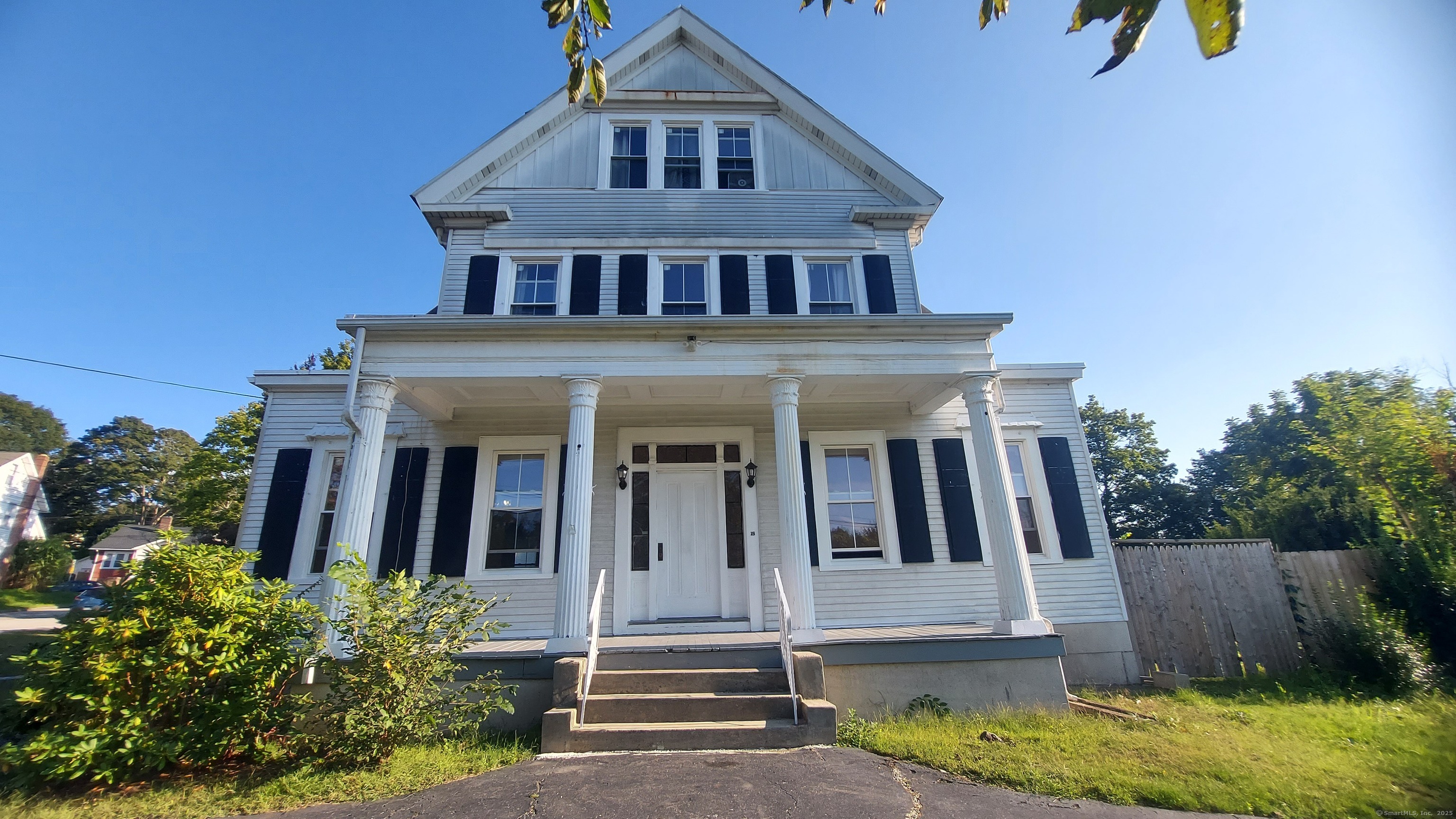 front view of house with a yard