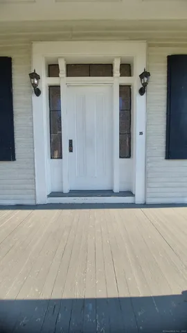 a kitchen with granite countertop a stove and a sink