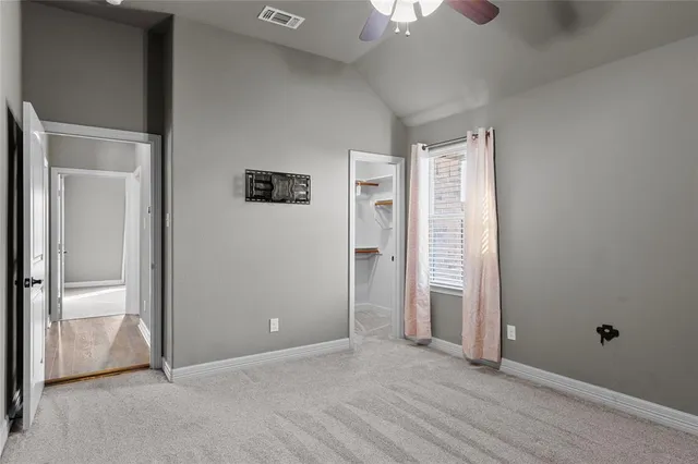 a view of a lake with a yard