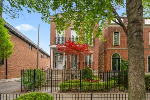 front view of a house with a garden