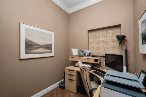 a view of a workspace with furniture