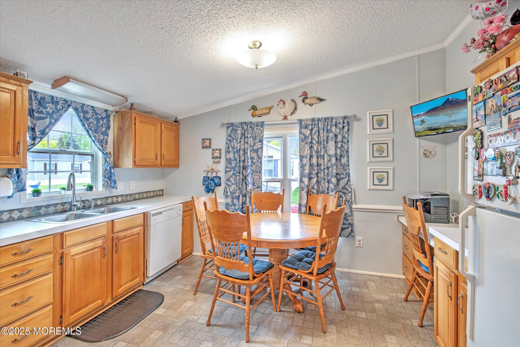 38 Village Road Morganville, NJ 07751 - Photo 12 of 20 a dining room with furniture and window