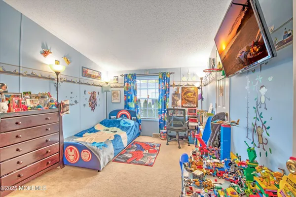 a view of a chairs and table in the patio