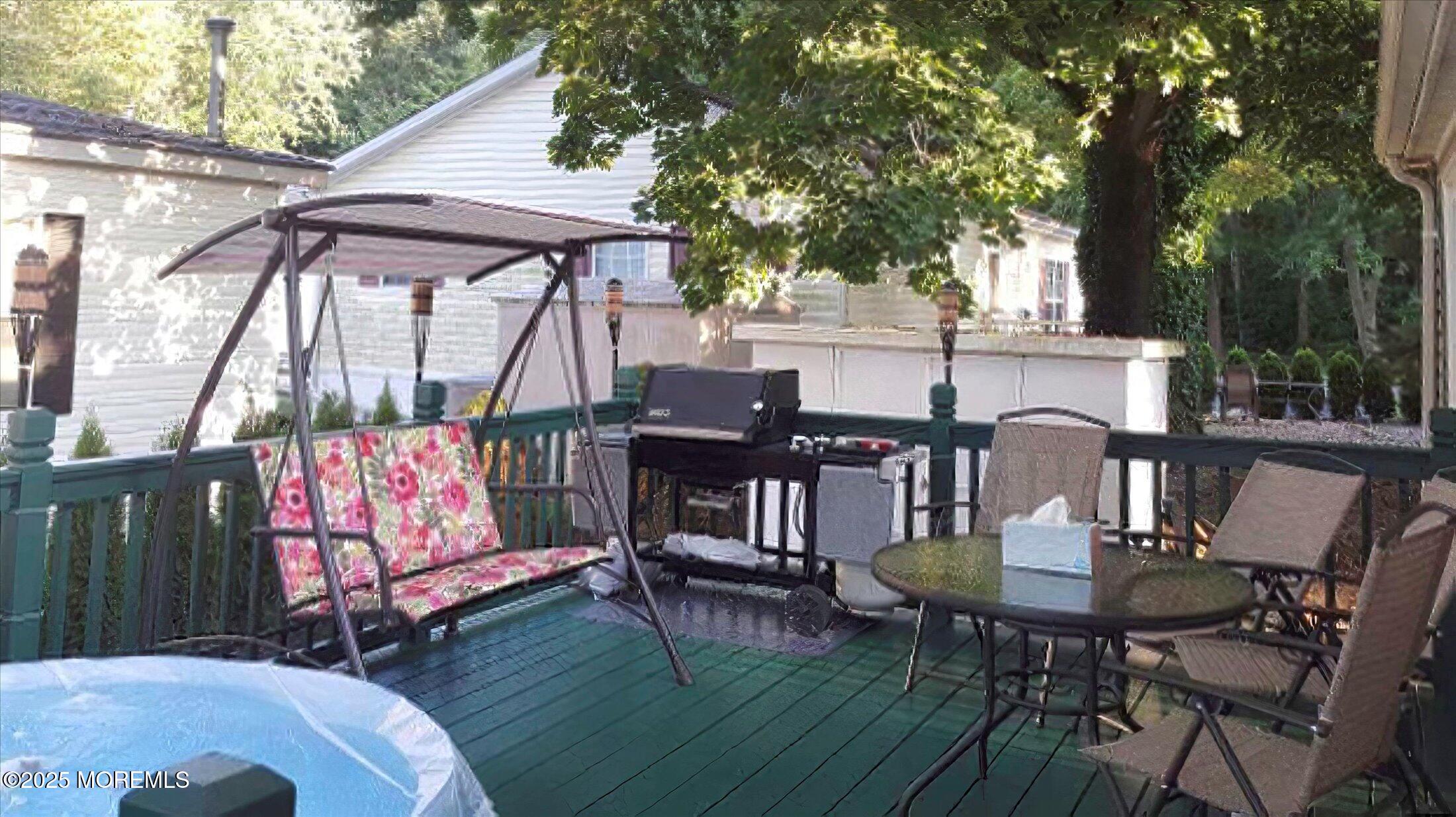 38 Village Road Morganville, NJ 07751 - Photo 20 of 20 a view of a chairs and table in the patio