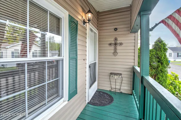 a view of a door and a window