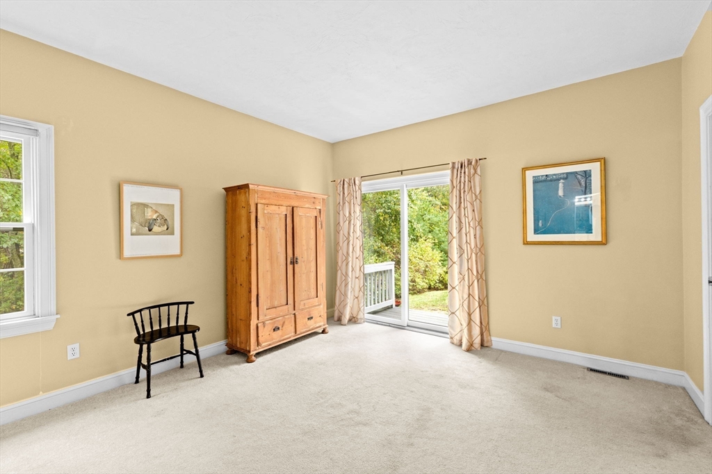 9 Forest Scituate Ma, Unit 9 Scituate, MA 02066 - Photo 19 of 35 a view of a livingroom with a staircase