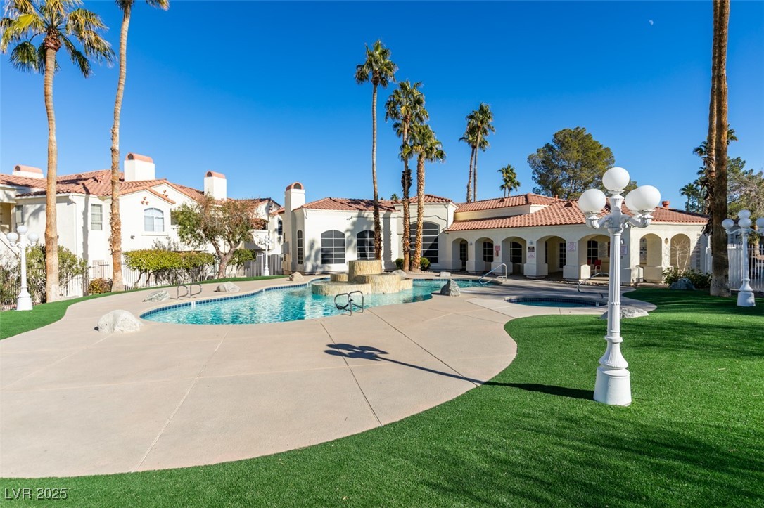 698 South Racetrack Road, Unit 711 Henderson, NV 89015 - Photo 25 of 25 Swimming pool with a patio and a yard