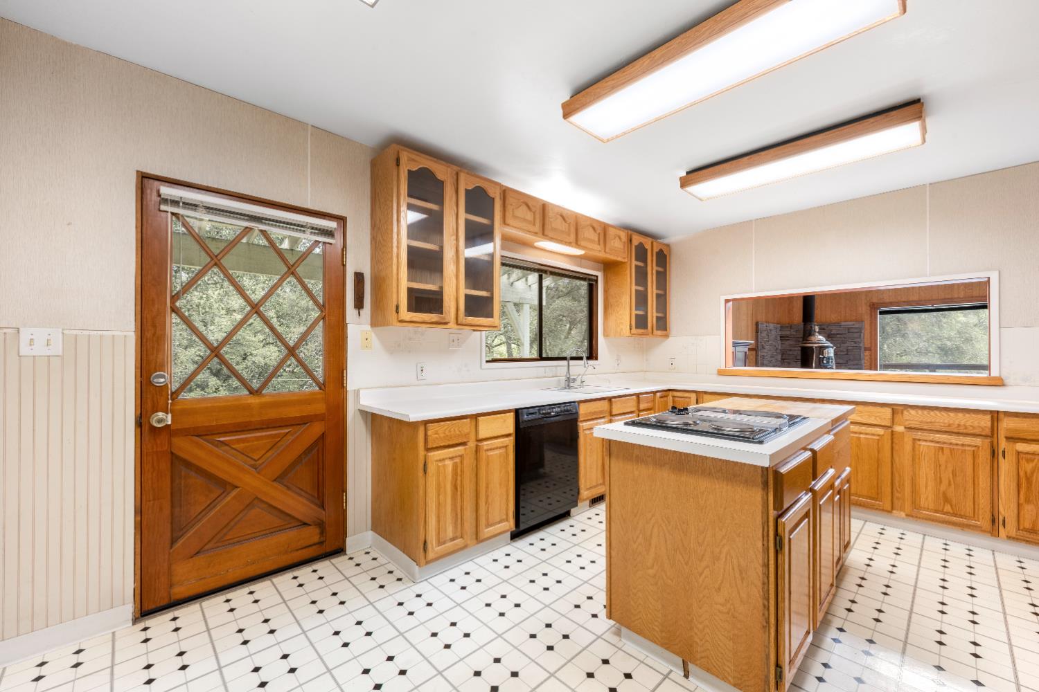 7321 Morning Canyon Road Placerville, CA 95667 - Photo 11 of 39 a kitchen with stainless steel appliances granite countertop a stove and a sink
