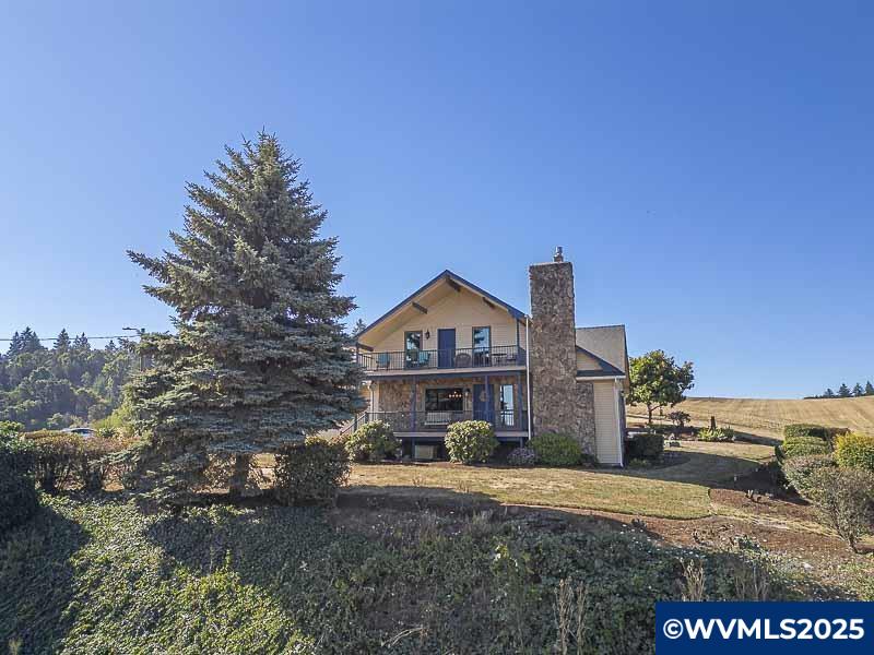 11660 Simpson Road Monmouth, OR 97361 - Photo 50 of 50 a front view of a house with a yard