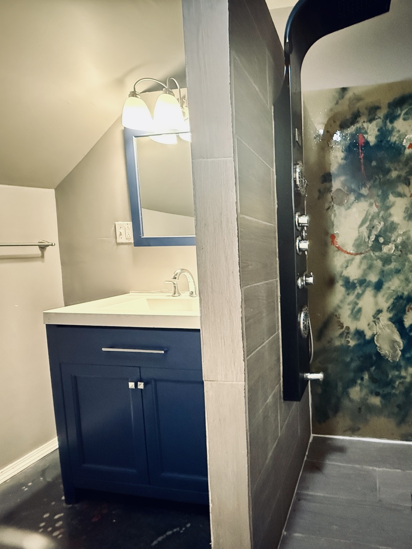 11725 South Morgan Street Chicago, IL 60643 - Photo 19 of 40 a bathroom with a sink and mirror