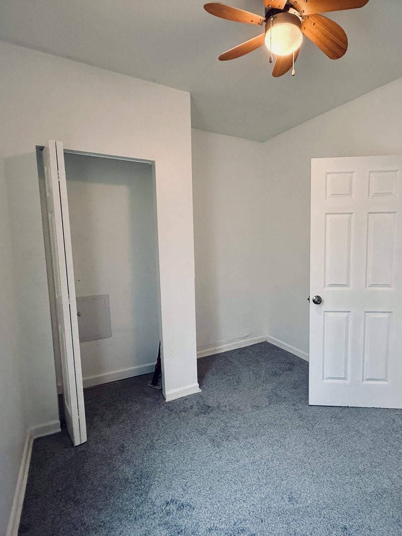 11725 South Morgan Street Chicago, IL 60643 - Photo 23 of 40 an empty room with fan