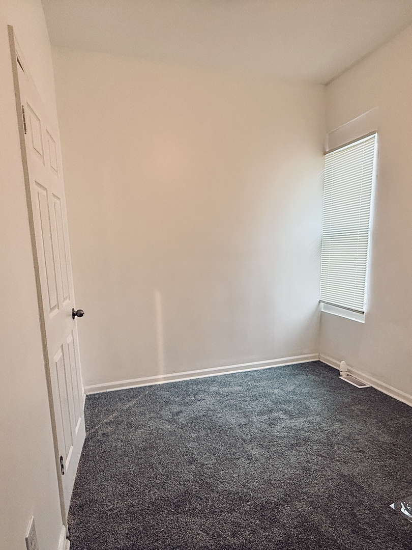 11725 South Morgan Street Chicago, IL 60643 - Photo 24 of 40 an empty room with a bench