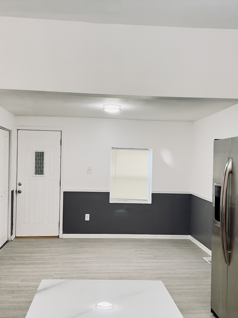 11725 South Morgan Street Chicago, IL 60643 - Photo 7 of 40 a view of a kitchen with a refrigerator and a sink