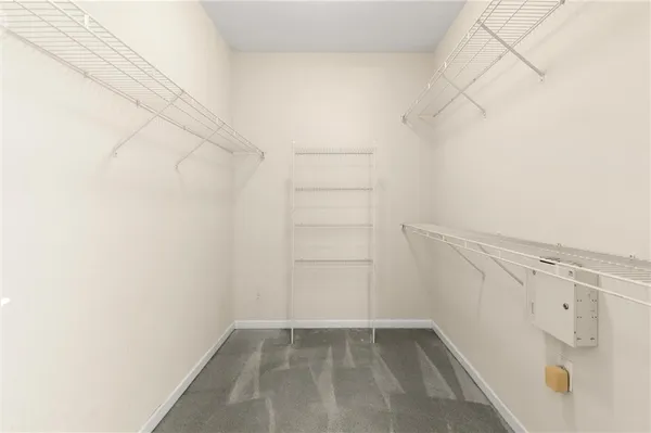 a view of a room with racks on the wall