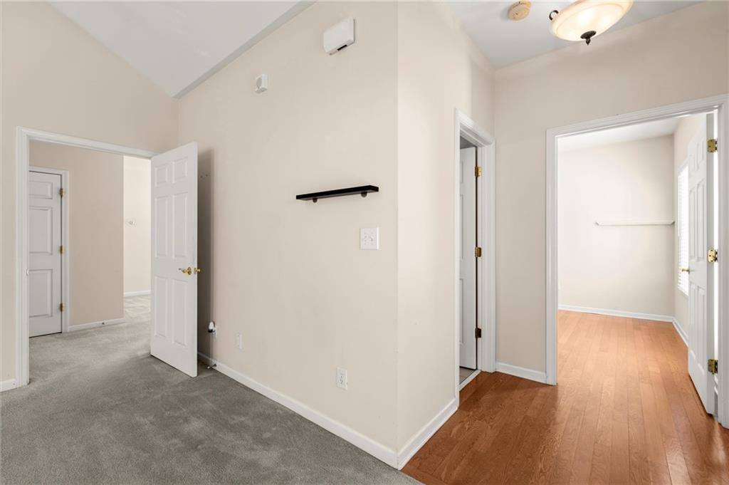 3361 Raes Creek Road, Unit 8 Marietta, GA 30008 - Photo 17 of 27 a view of hallway with wooden floor