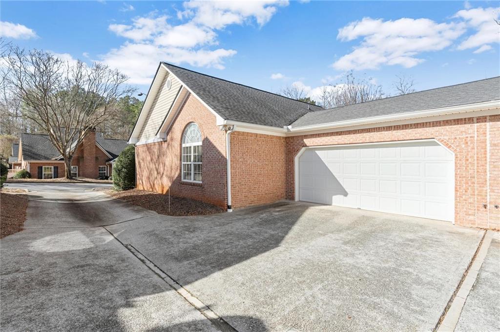 3361 Raes Creek Road, Unit 8 Marietta, GA 30008 - Photo 25 of 27 a view of backyard of house