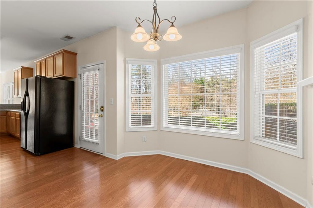 3361 Raes Creek Road, Unit 8 Marietta, GA 30008 - Photo 7 of 27 a view of an empty room with a window
