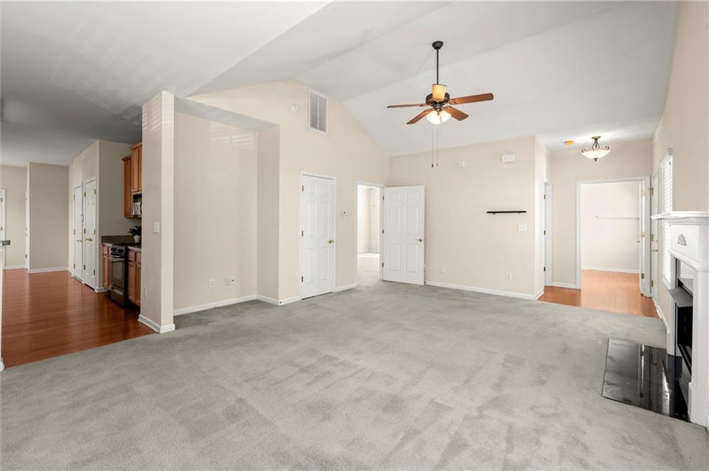 3361 Raes Creek Road, Unit 8 Marietta, GA 30008 - Photo 9 of 27 an empty room with closet and a ceiling fan