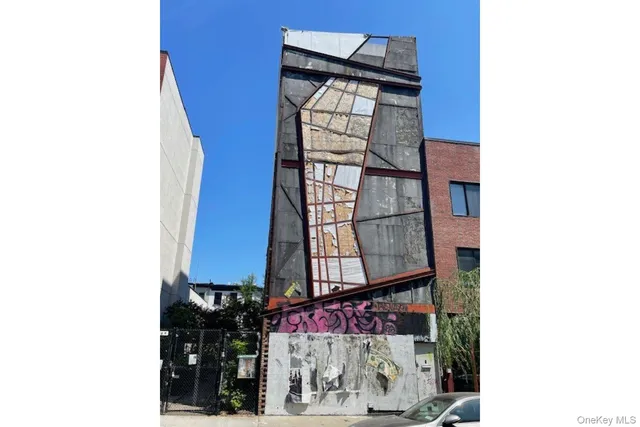 a view of staircase with a rug
