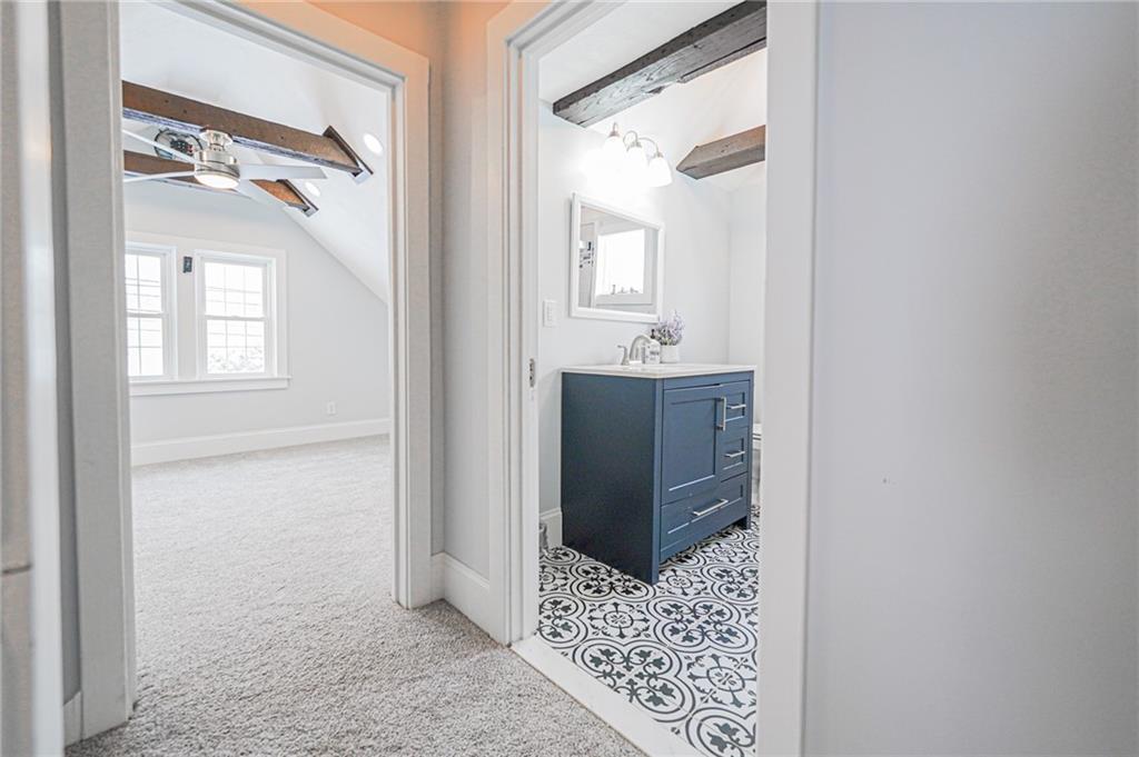 671 Old Rte 8 Harrisville, PA 16038 - Photo 39 of 49 a bathroom with a shower and a mirror