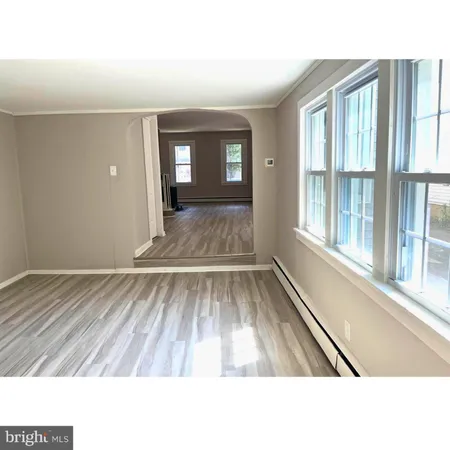 a black and white photo of an empty room