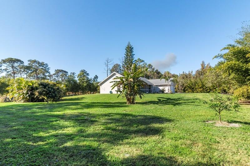 18916 93rd Road North Loxahatchee, FL 33470 - Photo 16 of 20 Side Yard