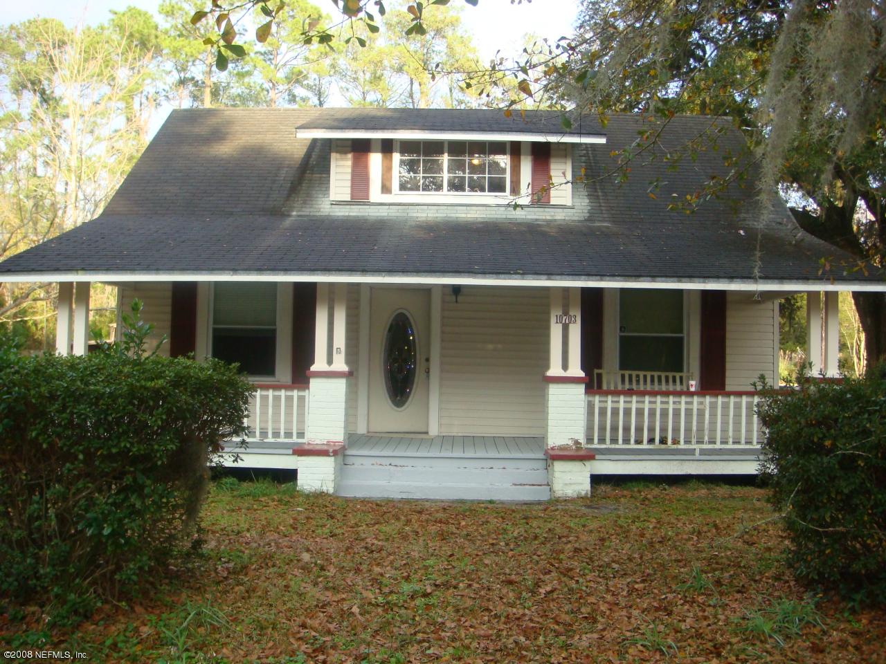 10703 Old Kings Road Jacksonville, FL 32219 - Photo 1 of 15 Front of home with Gorgeous oaks