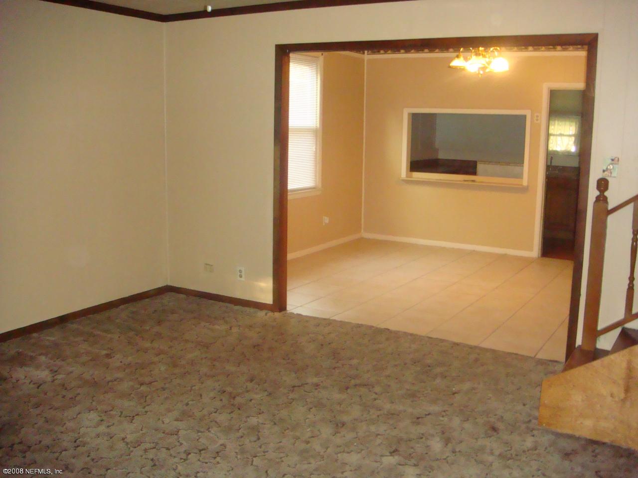 10703 Old Kings Road Jacksonville, FL 32219 - Photo 13 of 15 Living room looking into dining