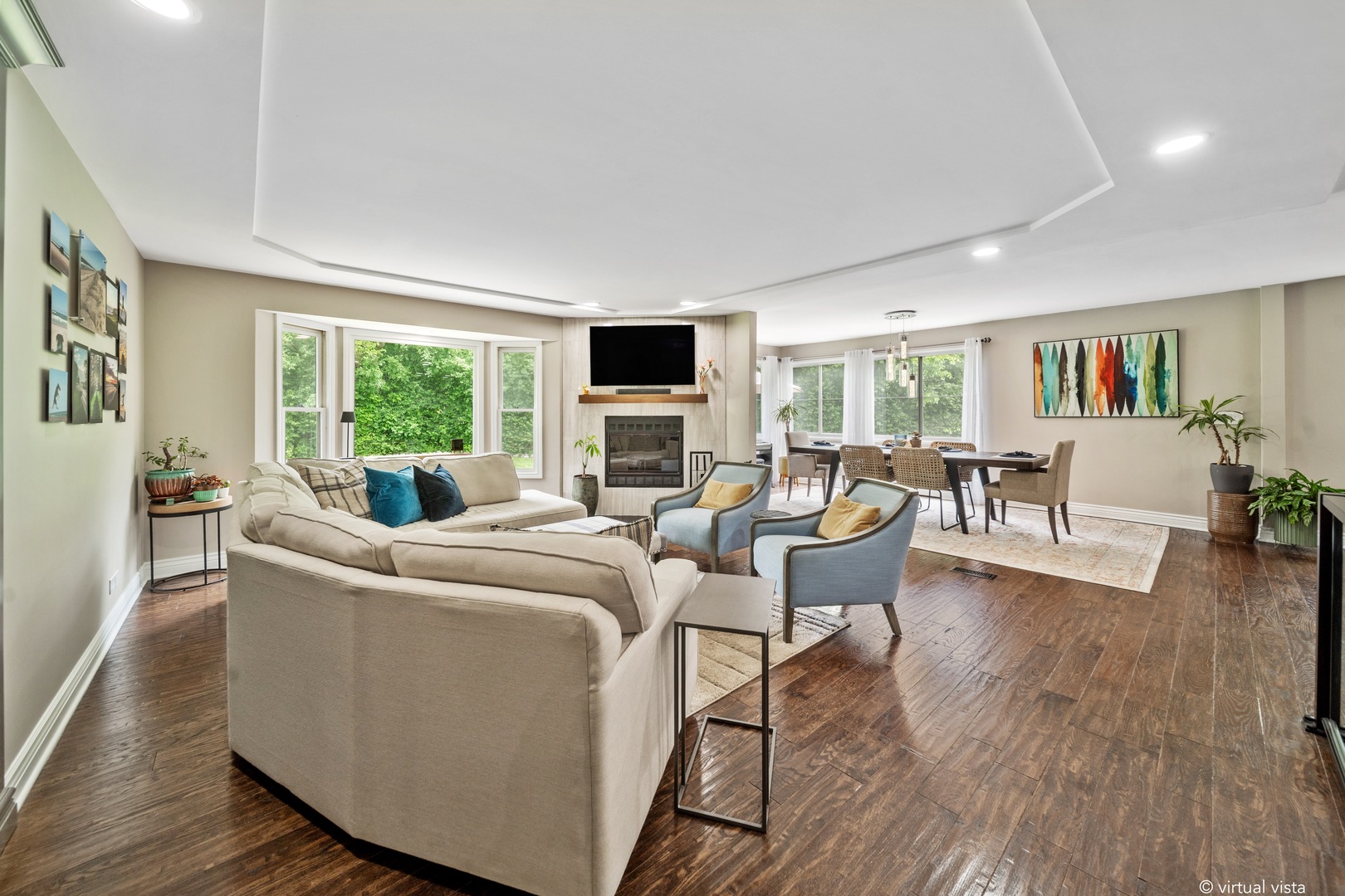 28W140 Mack Road Wheaton, IL 60189 - Photo 13 of 48 a living room with furniture a large window and a flat screen tv