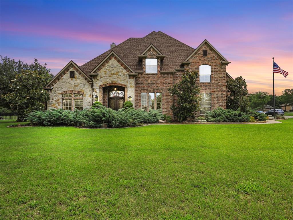 8655 Maplewood Drive Terrell, TX 75160 - Photo 1 of 1 a front view of a house with a yard