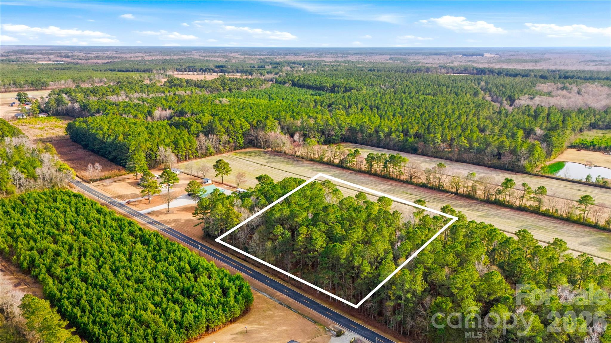 252 Long Corner Road Whiteville, NC 28472 - Photo 2 of 8 a view of swimming pool from a balcony