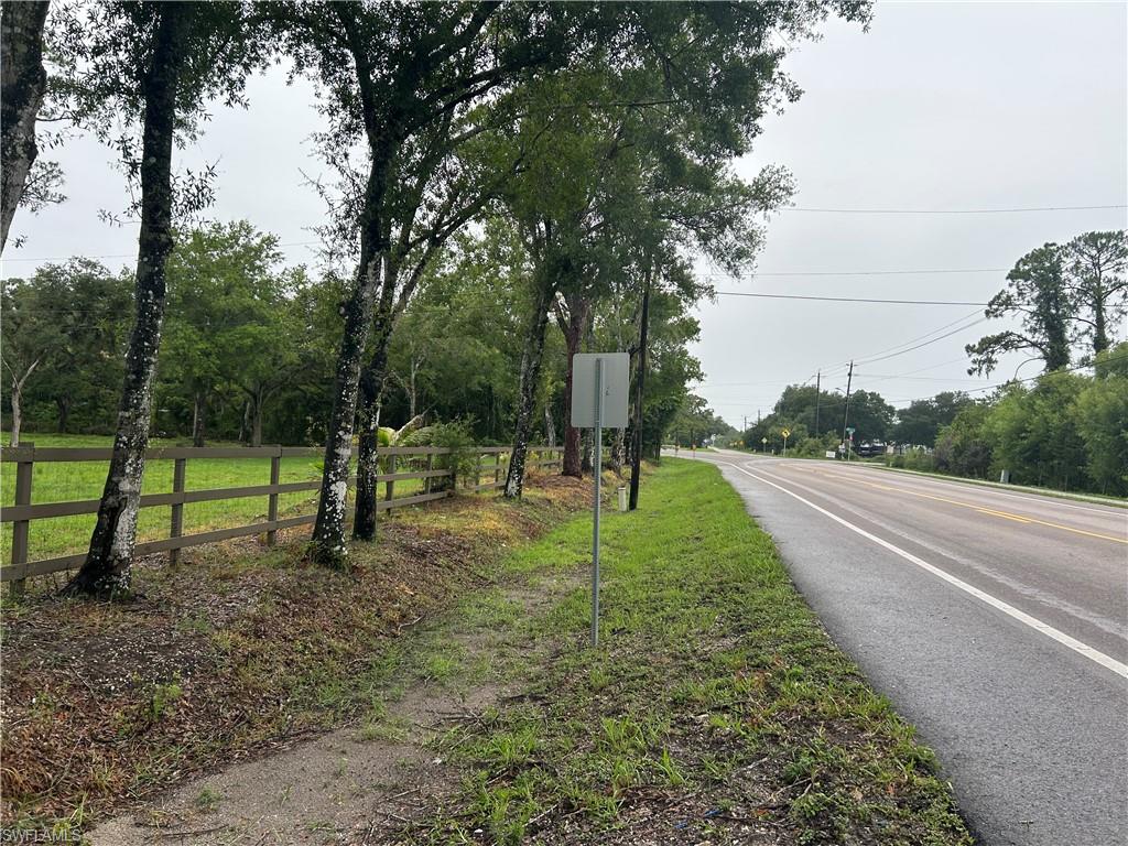 2115 Cr 78 Road North LaBelle, FL 33935 - Photo 5 of 10 View of asphalt road featuring traffic signs
