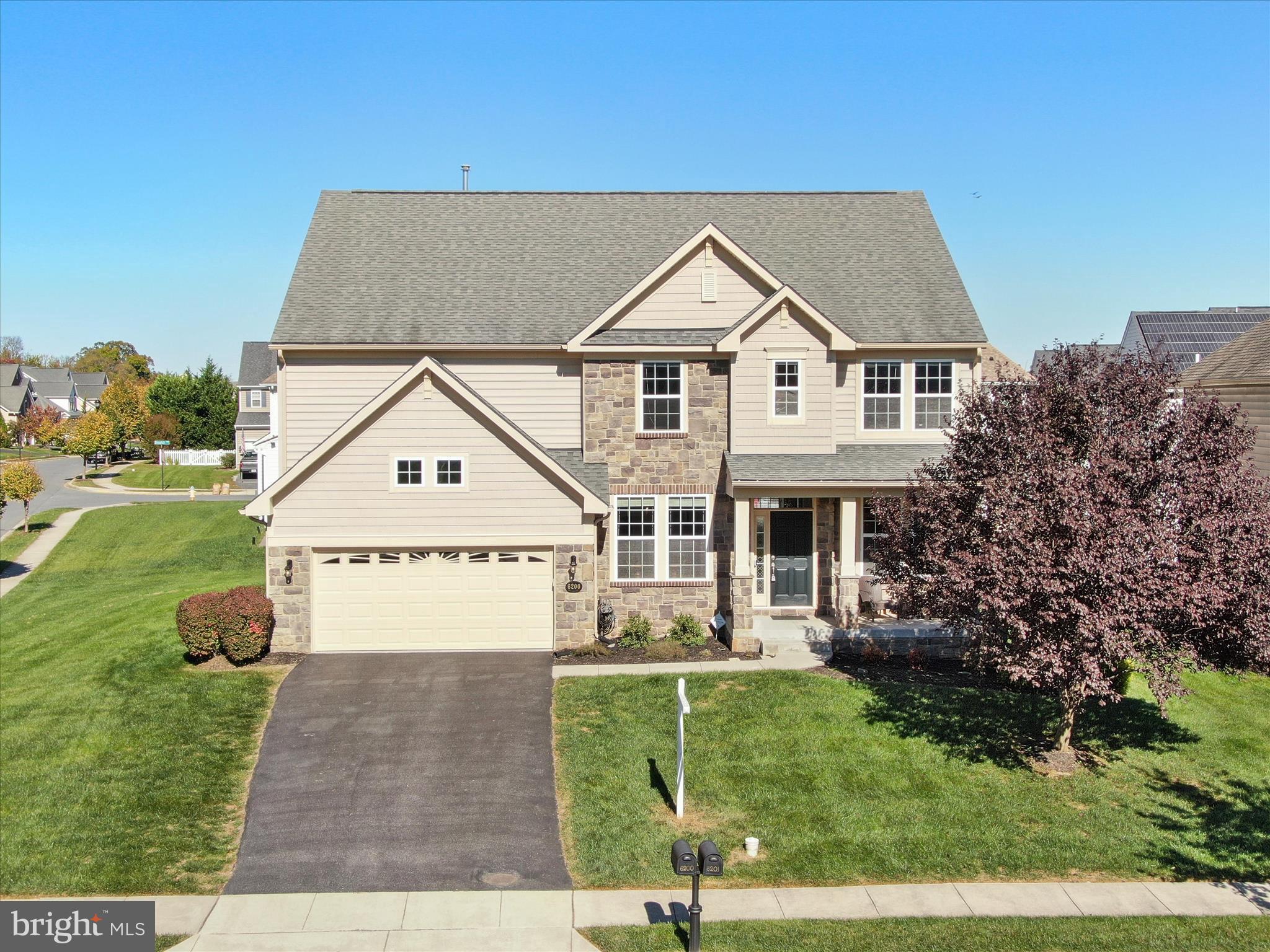 front view of house with a yard