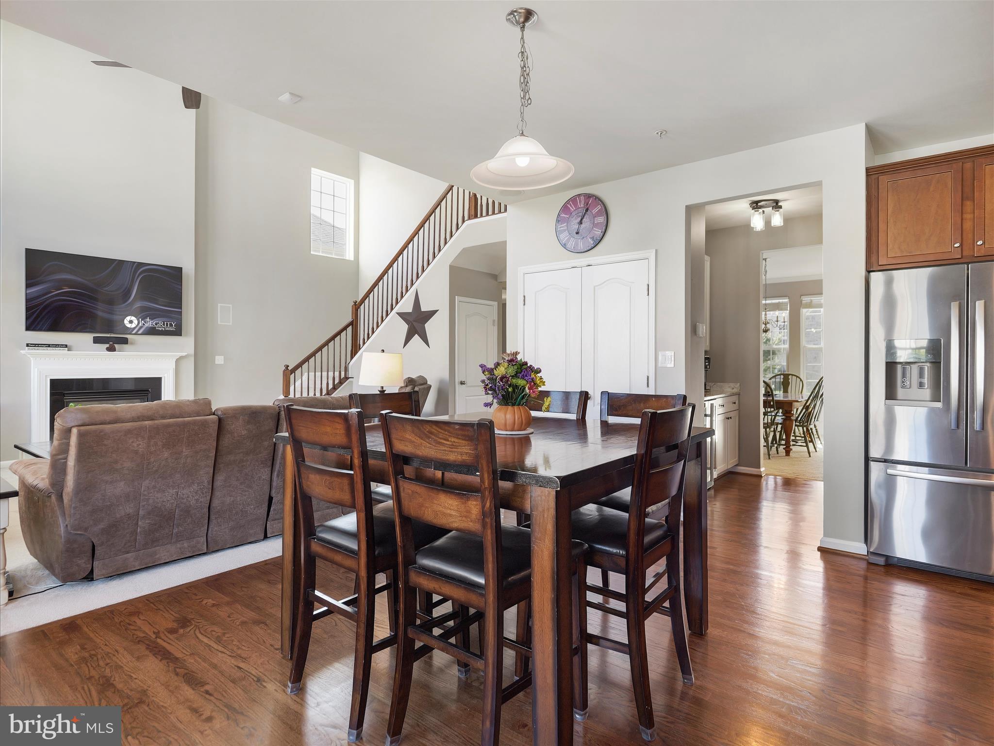 6200 Payton Way Frederick, MD 21703 - Photo 13 of 62 a view of a dining room with furniture and wooden floor
