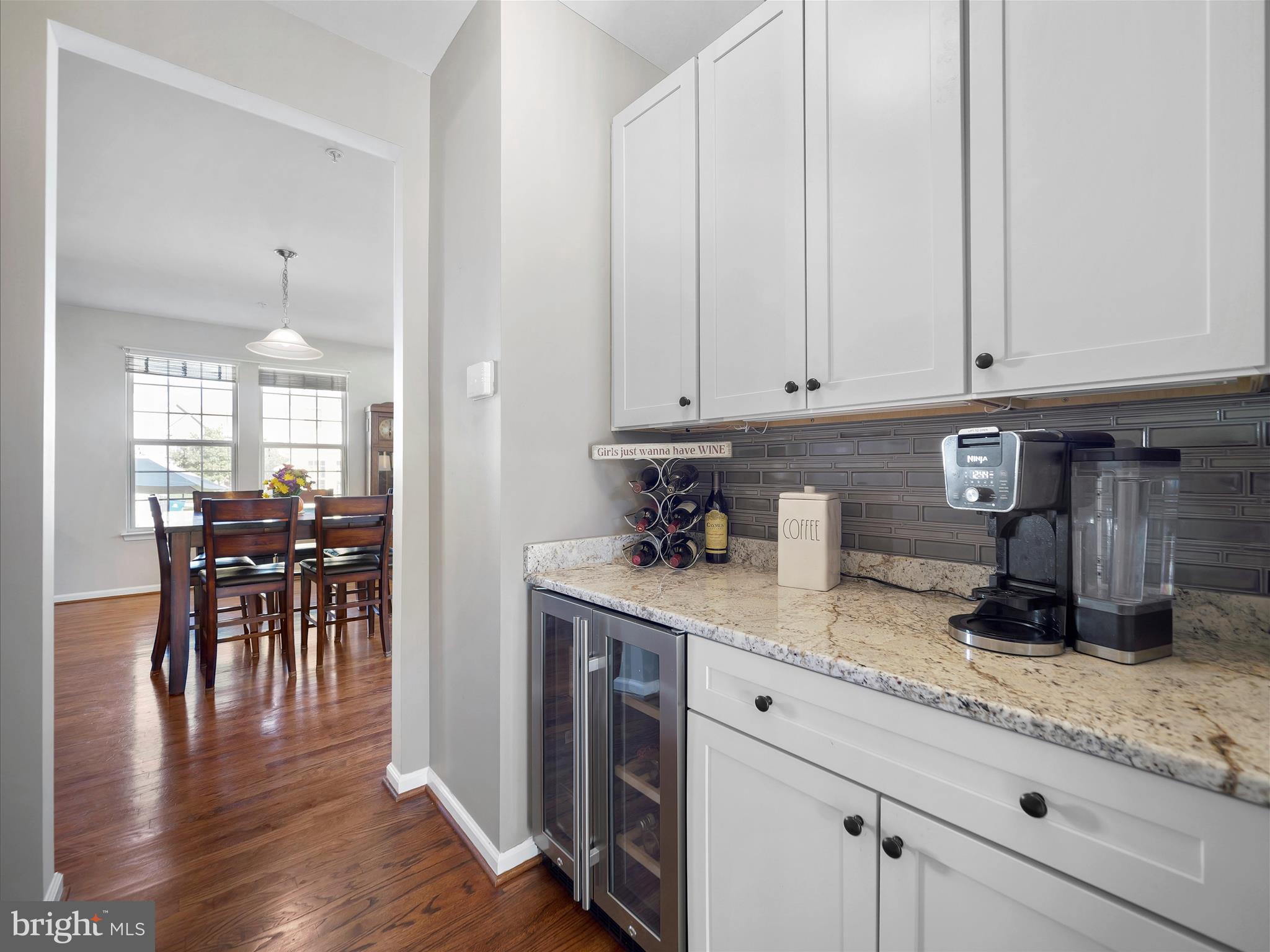 6200 Payton Way Frederick, MD 21703 - Photo 16 of 62 a kitchen with granite countertop a stove a sink and cabinets