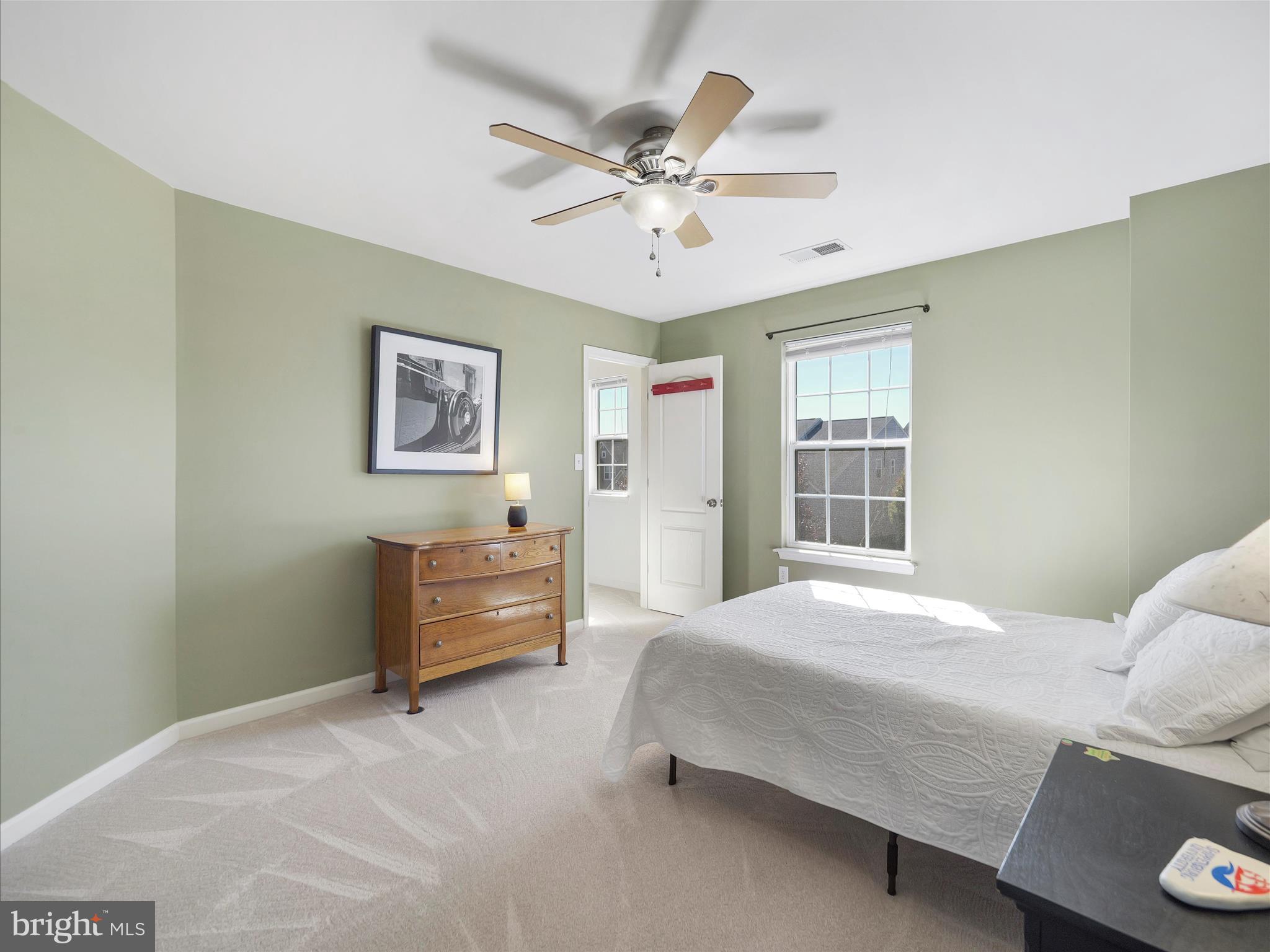 6200 Payton Way Frederick, MD 21703 - Photo 28 of 62 a bedroom with a bed and ceiling fan