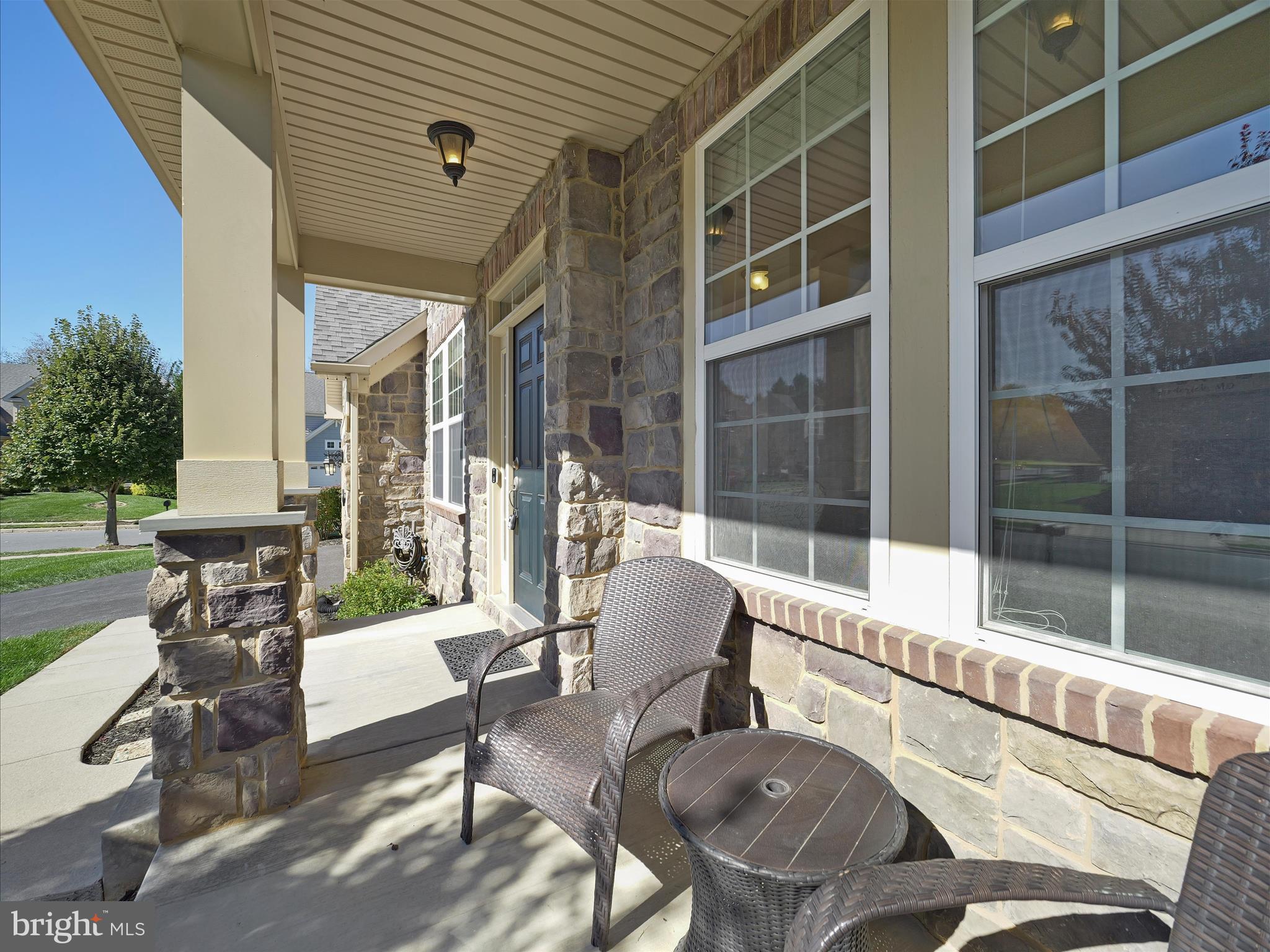 6200 Payton Way Frederick, MD 21703 - Photo 38 of 62 a balcony with table and chairs