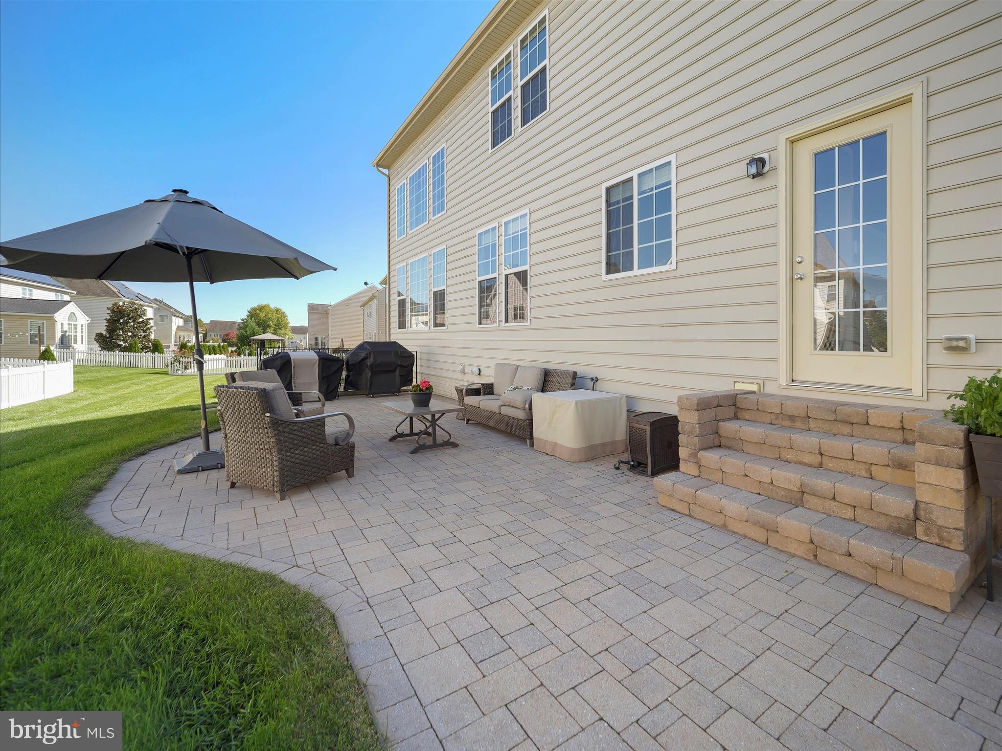6200 Payton Way Frederick, MD 21703 - Photo 40 of 62 a view of a house with backyard and sitting area