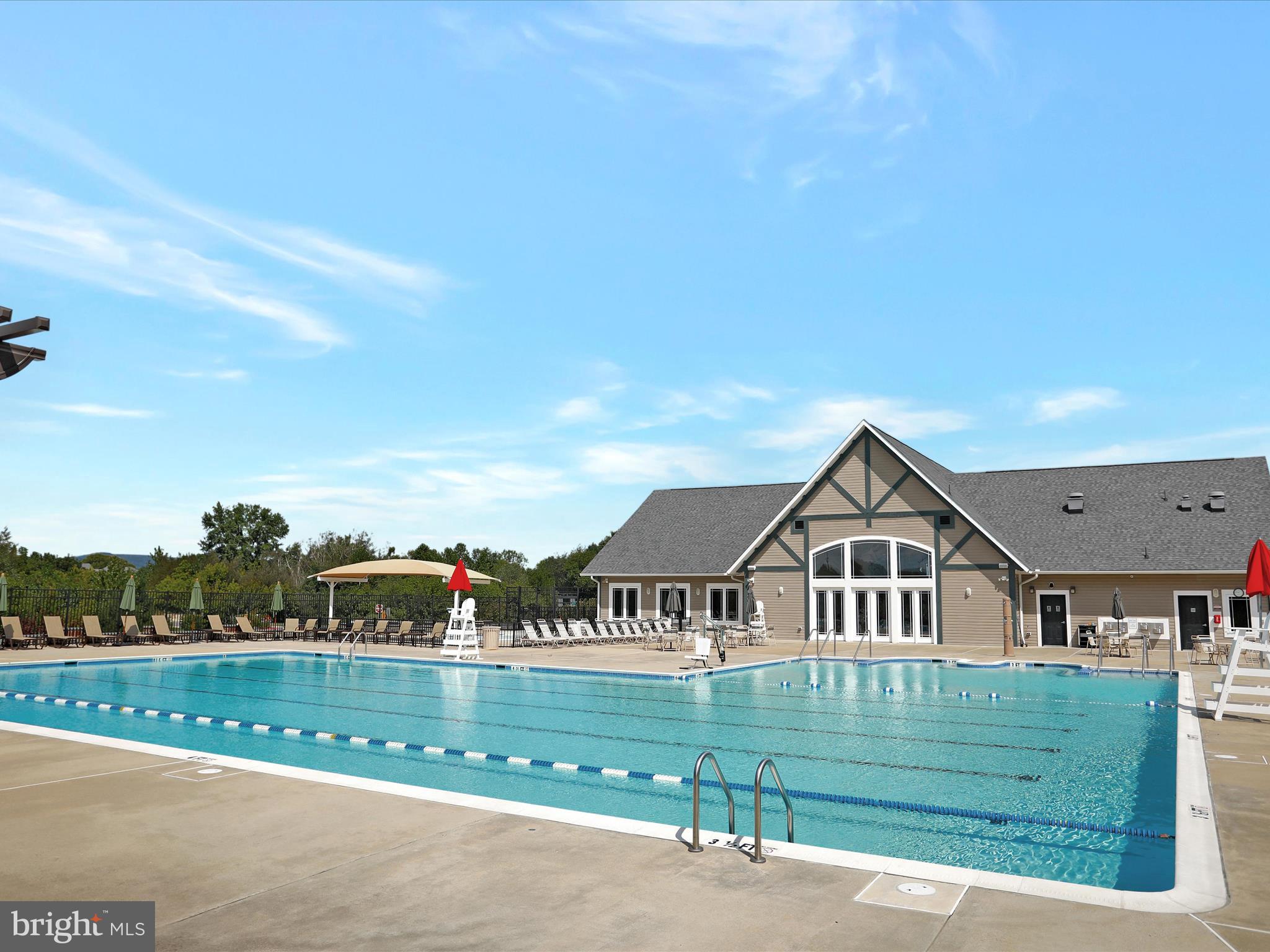 6200 Payton Way Frederick, MD 21703 - Photo 47 of 62 a front view of a house with a yard