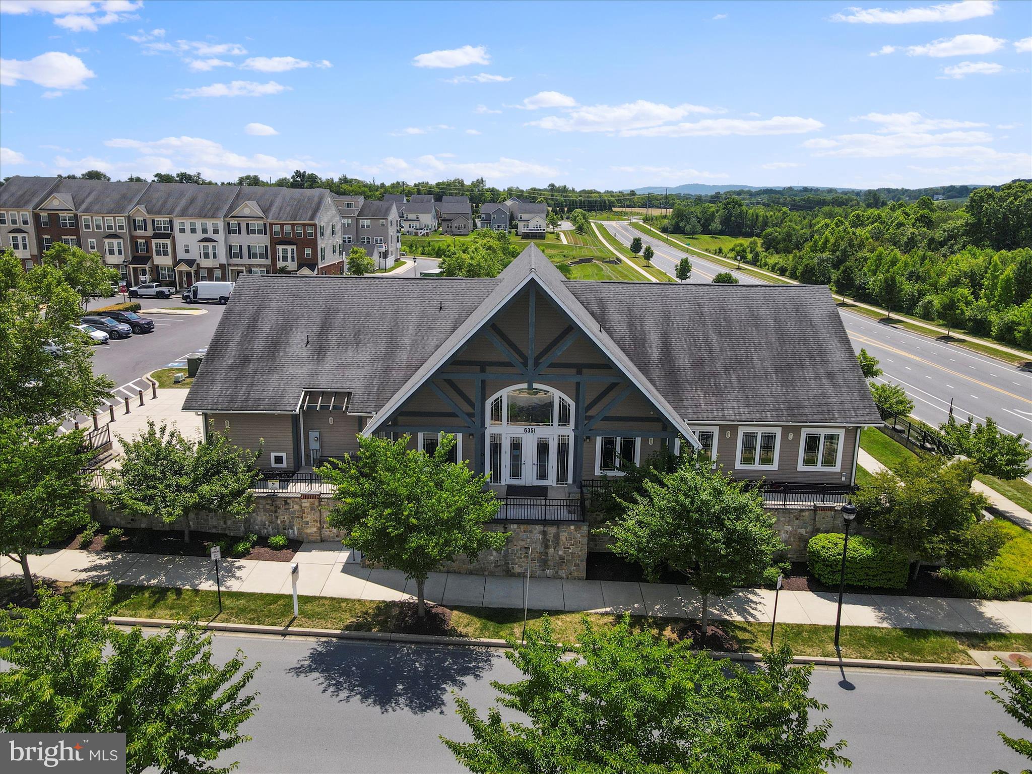 6200 Payton Way Frederick, MD 21703 - Photo 50 of 62 a aerial view of a house next to a yard and lake view