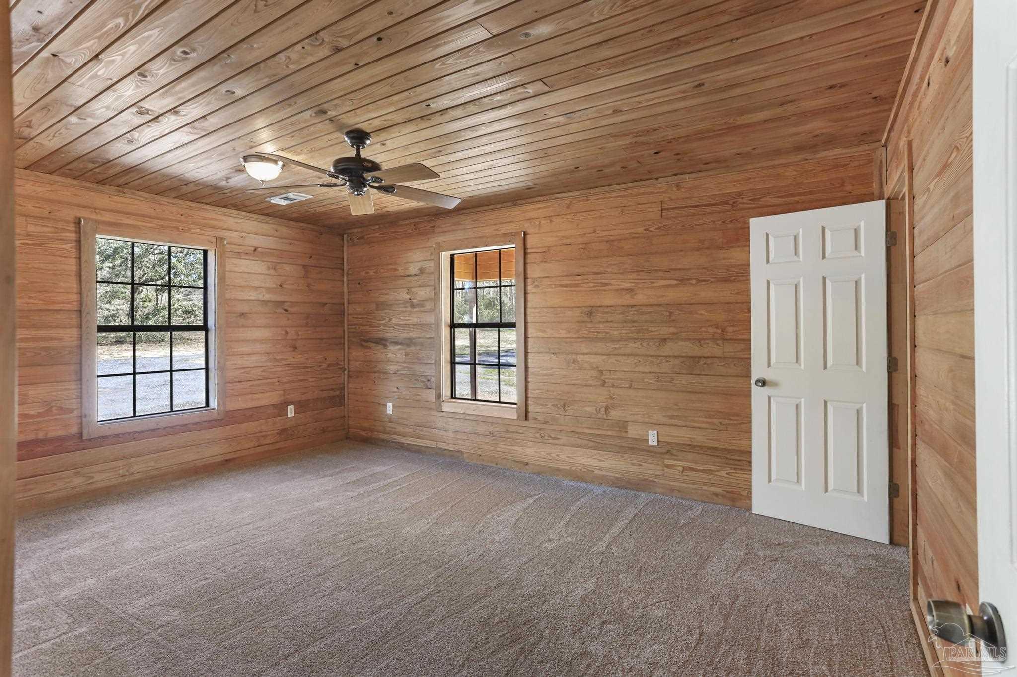 6856 Martin Road Milton, FL 32570 - Photo 24 of 50 a view of an empty room with a window